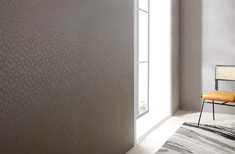 Woven vinyl wallcovering in a fine bamboo weave installed on a hotel feature wall
